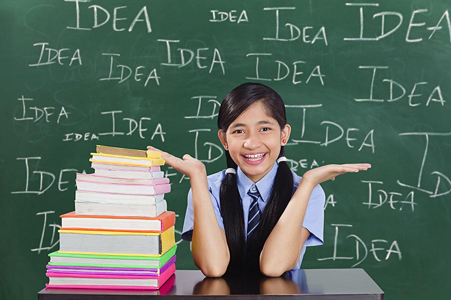 Happy Schoolgirl Student with stack-of-books While Showing Open hands ...