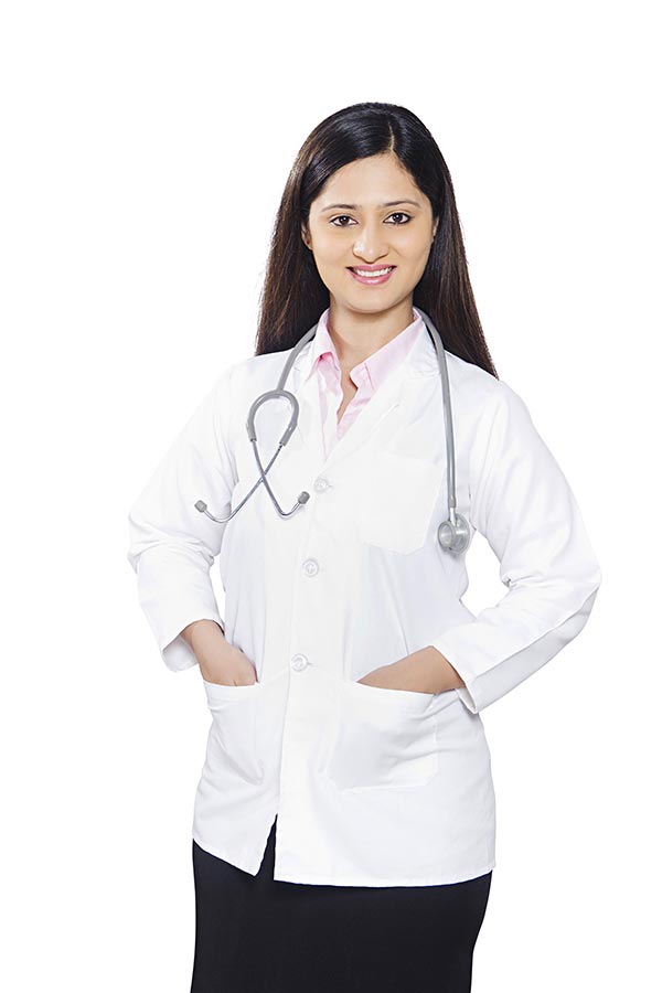 Professional Medical Doctor Woman With Stethoscope Hand-in-Pockets Standing