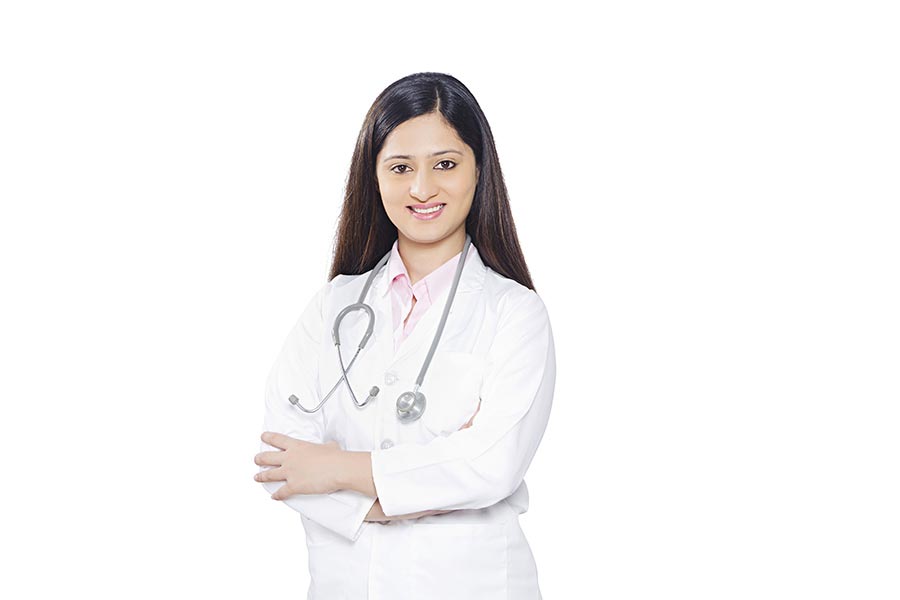 Indian Female Medical Doctor With Arms-crossed Standing On White Background