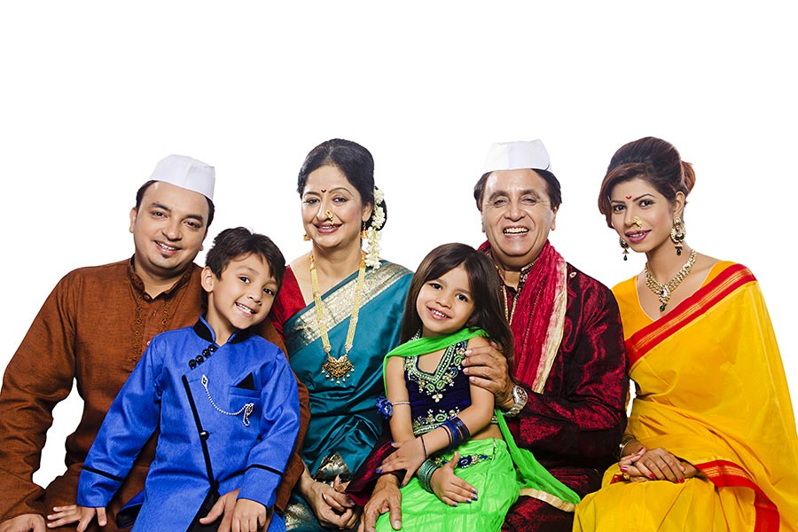 Multi Generation Indian Marathi Family Sitting Together Smiling