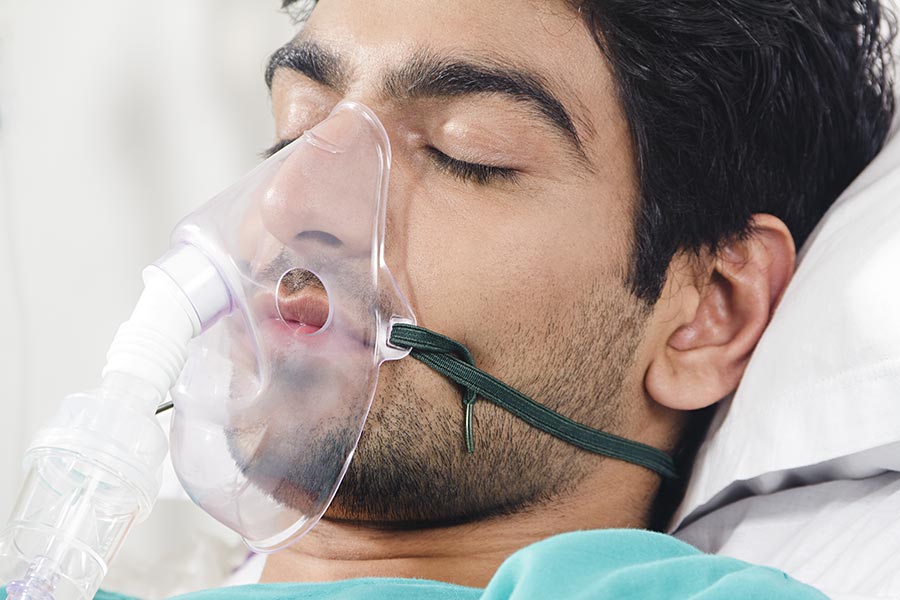 Adult-male patient in-hospital with oxygen mask Medical Healthcare Concept