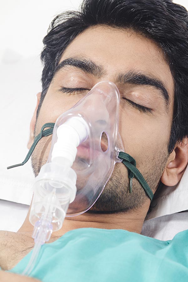 Close-up Man-patient Wearing Oxygen Mask In-hospital Bed Medical Treatment