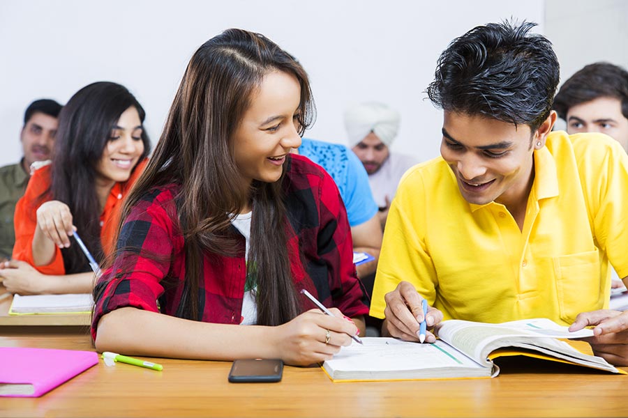 Indian College Friend Students Classmate Reading Book Studying ...