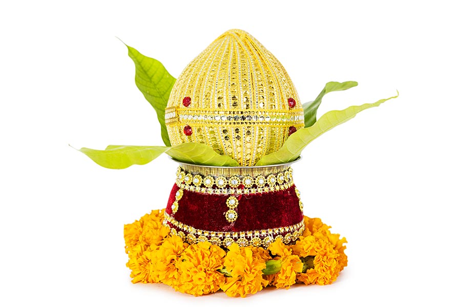 Close Up Kalash Or Mango Leaf Flower With Coconut Griha Pravesh