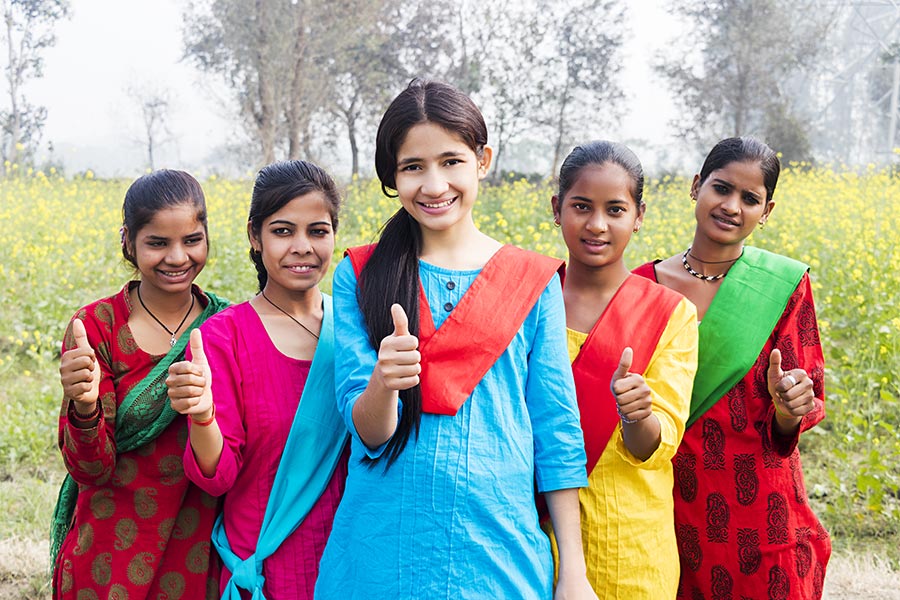 Group Indian Teenager Girls Friends Showing Thumbs-up Success At-Farm