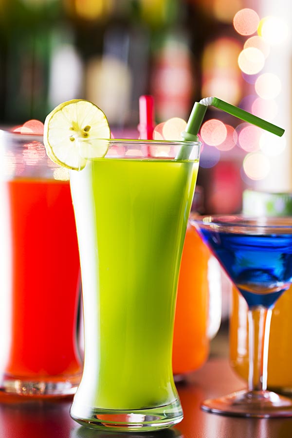 Close Up Of Mocktails In Glasses In Bar Counter At Night Club