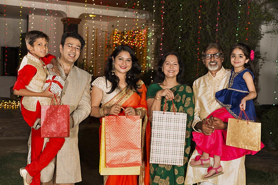 Group Indian Big-Family Holding Shopping-Bags Standing Outside At-Home ...