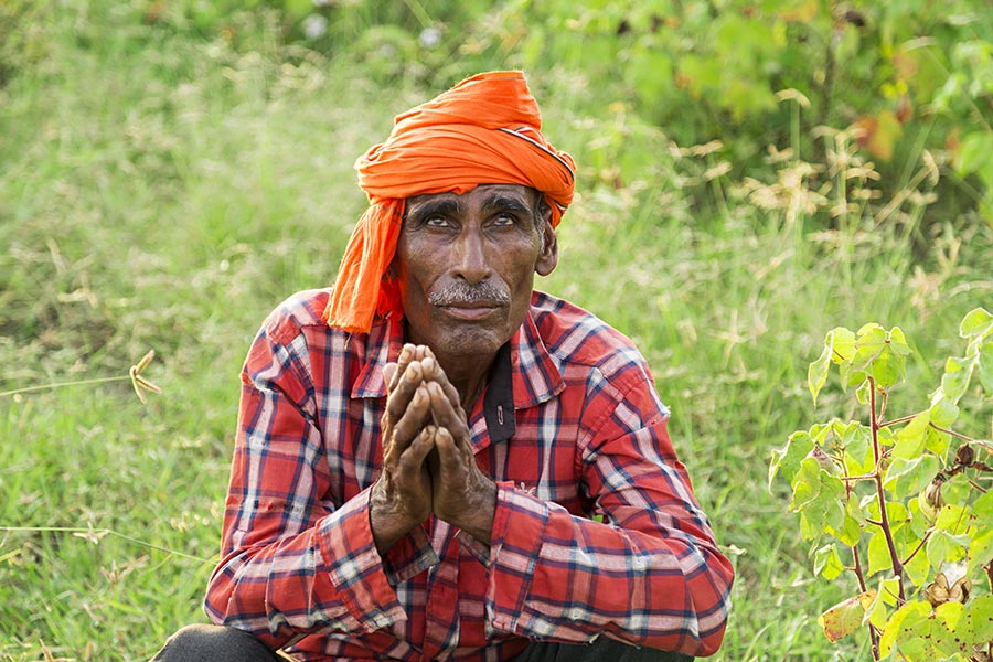 Indian Rural Farmer Old man Joined Hands Stress Sitting Farm