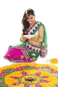 Woman Diwali Rangoli Clicking Photo