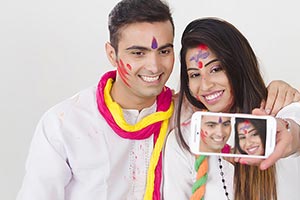 Couple Holi Celebrating Enjoying Taking Selfie pic