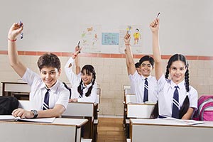 School Students Classroom  Hand Raised