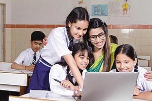 Teacher Students Laptop Guidance