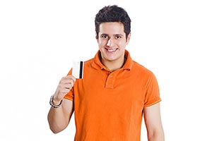 Man Showing Debit Card