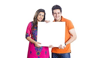 Indian Couple Showing Message Board