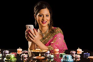 Woman Diwali Lighting Diyas Chatting Phone