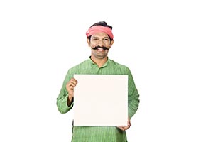 Rural Man Holding Message Board