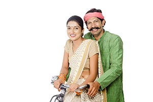 Rural Couple Riding Bicycle