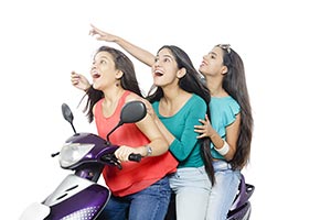 Girls Friends Riding Scooty