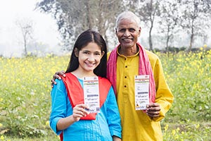 2 People ; 50-60 Years ; Aadhaar Card ; Adult Man 
