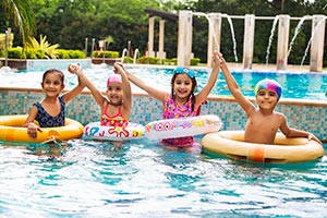 3-5 People ; Arms Raised ; Bathing ; Bonding ; Boy